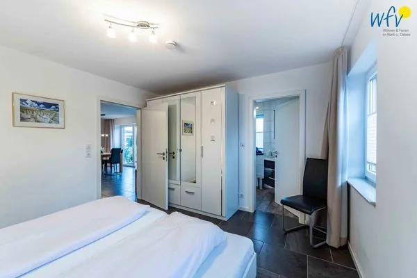 Schlafzimmer Haus Dünenrose Ferienwohnung Arielle