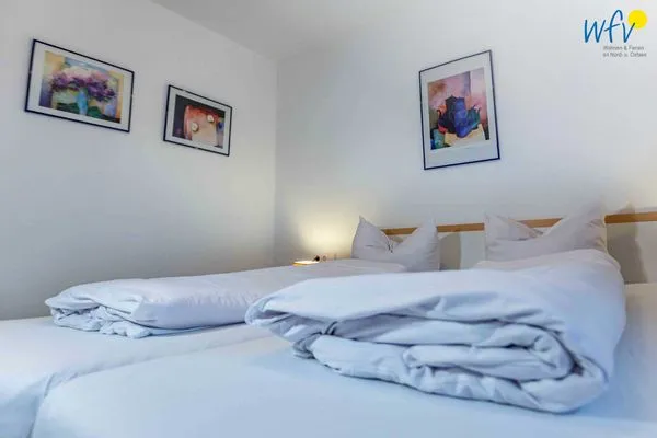 Schlafzimmer Haus Dünenrose Ferienwohnung Arielle