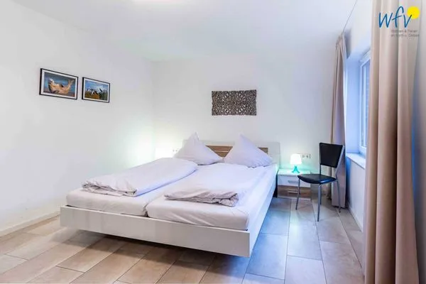 Schlafzimmer Haus Dünenrose Ferienwohnung Octopus