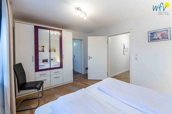 Schlafzimmer Haus Dünenrose Ferienwohnung Neptun