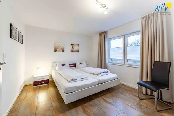Schlafzimmer Haus Dünenrose Ferienwohnung Neptun