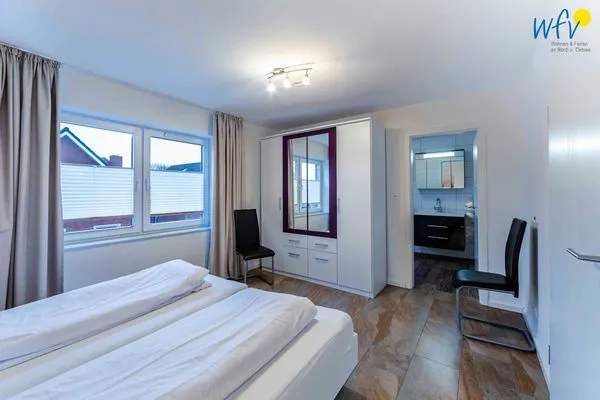 Schlafzimmer Haus Dünenrose Ferienwohnung Neptun