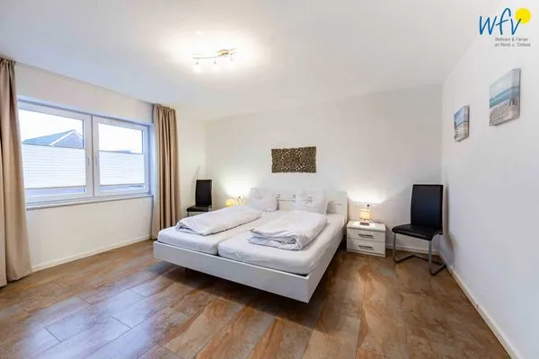 Schlafzimmer Haus Dünenrose Ferienwohnung Neptun