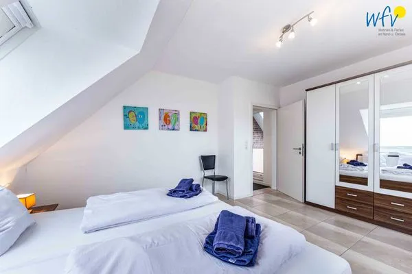 Schlafzimmer Haus Inseltraum Borkum Ferienwohnung Muschelsucher