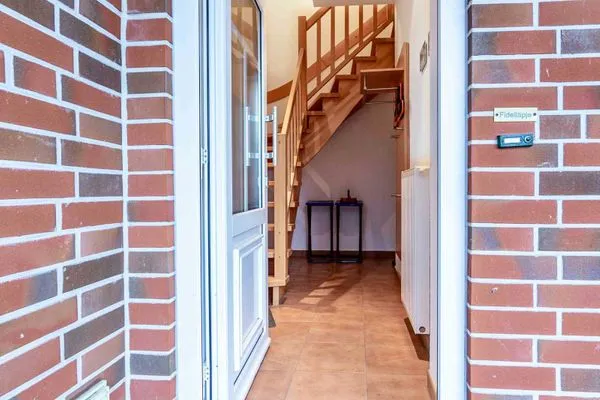 Fassade / Eingang Huus an de Tune Ferienwohnung Fidellapje