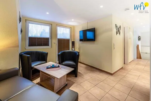 Wohnzimmer Huus an de Tune Ferienwohnung Fidellapje