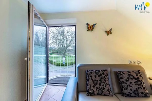 Wohnzimmer Huus an de Tune Ferienwohnung Fidellapje