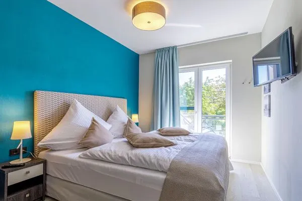 Ferienwohnung Kroonkieker Ostseebad Wustrow - ZweiWasser Alte Seefahrtschule Schlafzimmer  Kroonkieker