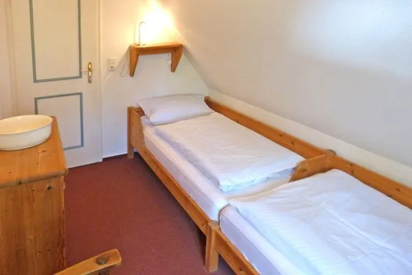 Schlafzimmer in der Ferienwohnung Sillo´s Hüs 3 in Nebel auf Amrum  *Sillo´s Hüs 3*