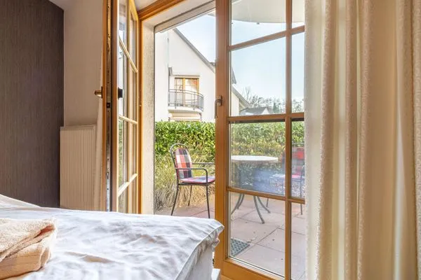 Schlafzimmer mit Doppelbett Ferienpark Freesenbruch Wohnung 2.1 - Möwennest