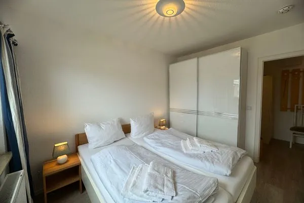 Schlafzimmer Ferienwohnung im Haus Nordland App 41