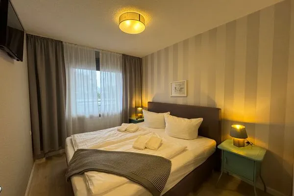 Schlafzimmer Ferienwohnung im Haus Nordland App 118 (Hund)