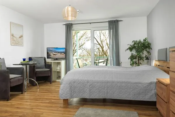 Wohnzimmer Residenz am Yachthafen Mann un Fru