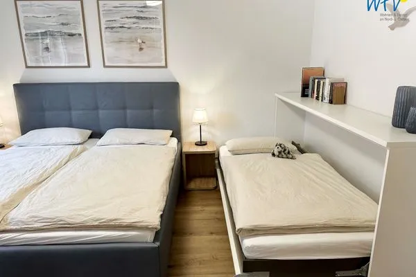 Schlafzimmer Haus Dünenrose Ferienwohnung Seehund