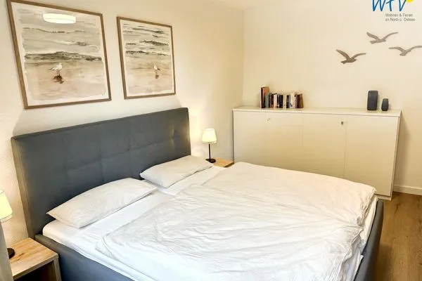 Schlafzimmer Haus Dünenrose Ferienwohnung Seehund