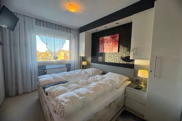 Schlafzimmer Ferienwohnung im Haus Nordland App 44