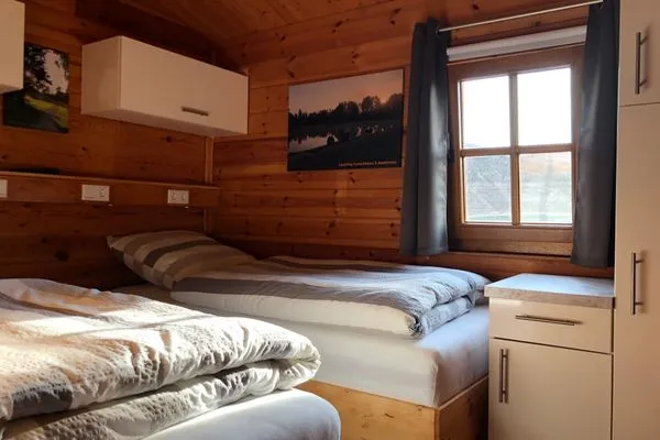 Schlafzimmer  Marlies - Lastering Ferienhäuser & Apartments