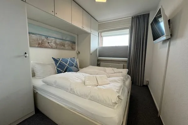 Schlafzimmer Ferienwohnung im Haus Nordland App 61