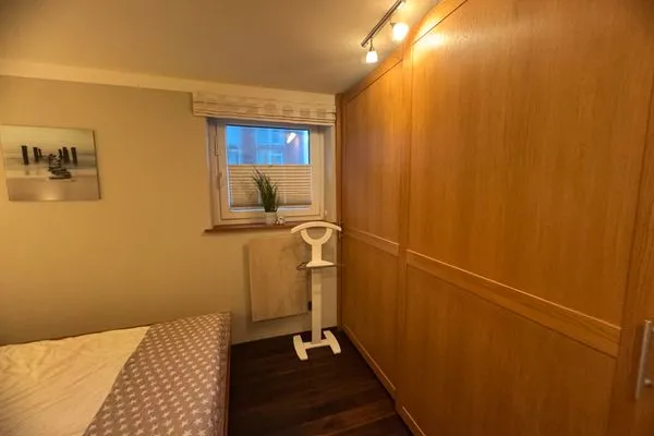 Schlafzimmer Ferienwohnung Brandenburgerstr. 11 - Dühne16 mit kleinem Meerblick