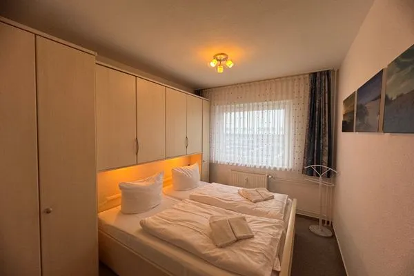 Schlafzimmer Ferienwohnung im Haus Nordland App 75