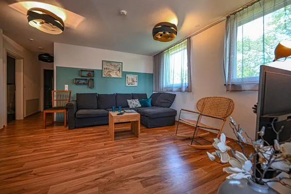 Wohnzimmer  Apartment Gartenblick 7c mit überdachtem Balkon