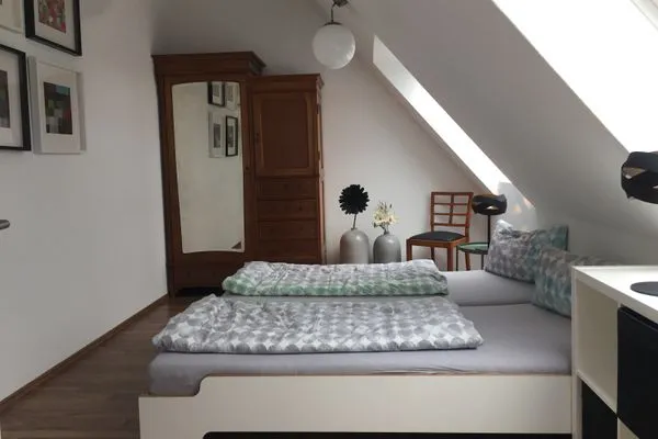 Schlafzimmer  Apartment Gartenblick 7c mit überdachtem Balkon