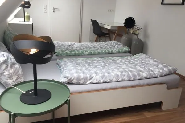 Schlafzimmer  Apartment Gartenblick 7c mit überdachtem Balkon