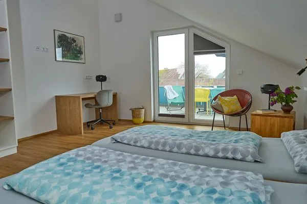 Schlafzimmer  EntdeckerFERIEN Apartment 7/7 DG Bergblick mit großem Balkon