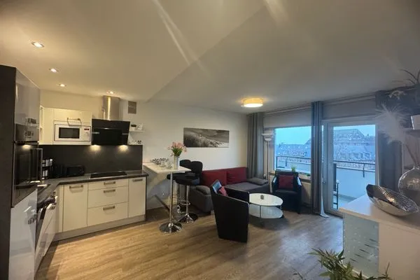 Küche offen zum Wohnbereich Ferienwohnung im Haus Nordland App 97