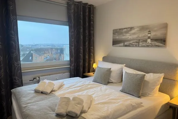 Schlafzimmer Ferienwohnung im Haus Nordland App 97