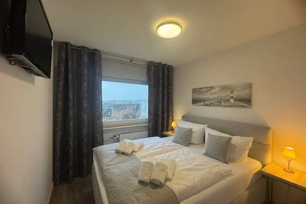 Schlafzimmer Ferienwohnung im Haus Nordland App 97