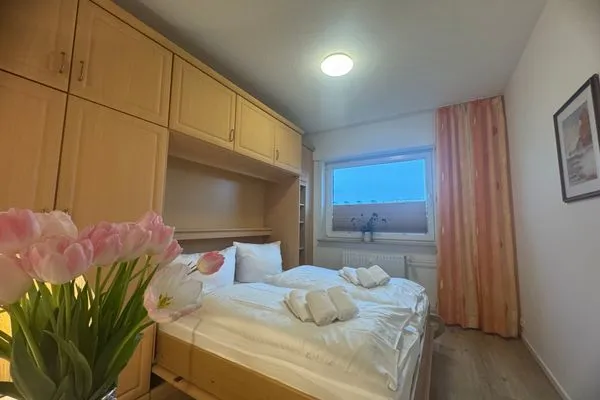 Schlafzimmer Ferienwohnung im Haus Nordland App 22