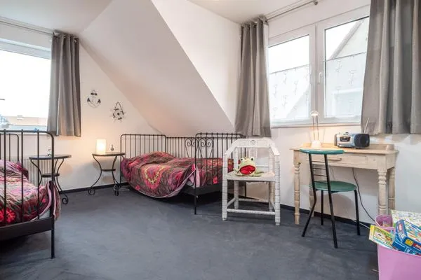 Schlafzimmer mit Einzelbetten in der 1. Etage  Ferienwohnung Ohana