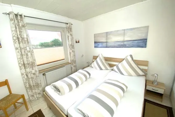 Schlafzimmer  Ferienwohnung Ostfriesenmuschel