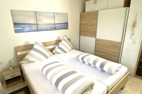 Schlafzimmer  Ferienwohnung Ostfriesenmuschel