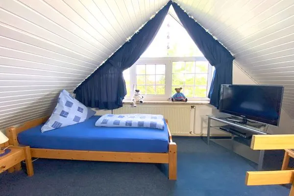 Schlafzimmer  Ferienwohnung Jolle