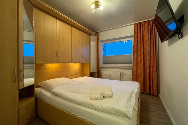 Schlafzimmer Ferienwohnung im Haus Nordland App 76 (Hund)