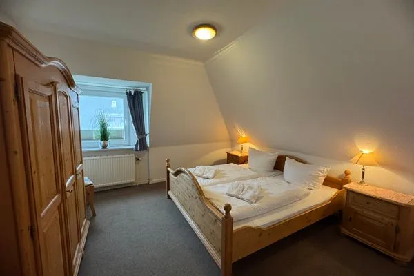 Schlafzimmer Ferienwohnung im DikWai Fewo A in Rantum