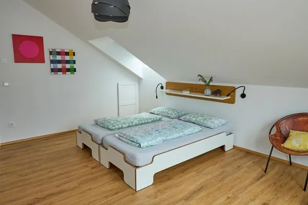 Schlafzimmer  Apartment 7/8 DG mit Bergblick