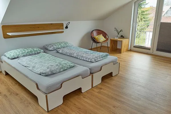 Schlafzimmer  Apartment 7/8 DG mit Bergblick