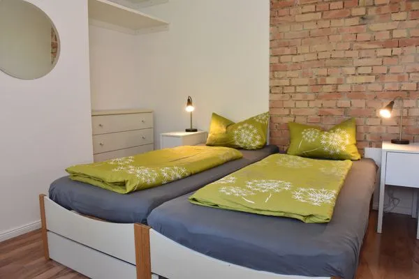 Schlafzimmer  Romantische Wohnung Gleis 1 im historischen Bahnhof mit Terrasse