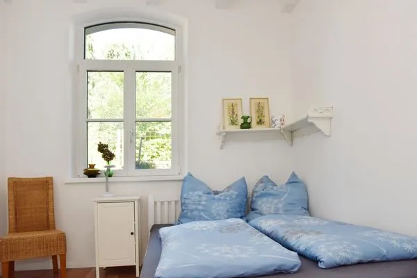 Schlafzimmer  Romantische Wohnung Wartesaal im historischen Bahnhof mit Terrasse