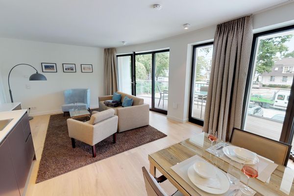 Luxussuite mit Sauna & Balkon – nur Minuten vom Strand