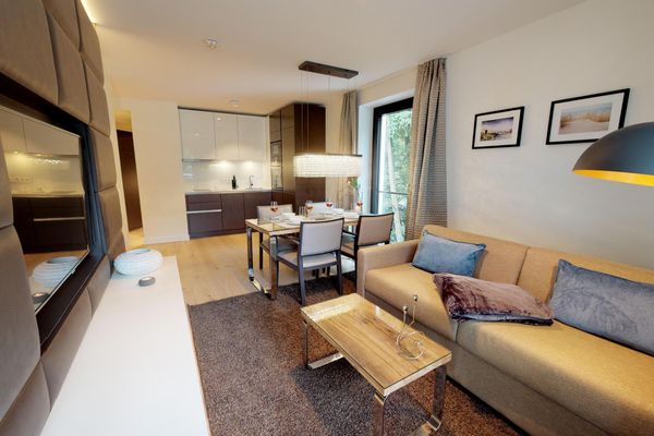 Luxusapartment mit eigener Sauna & Sonnenbalkon – nur Minuten vom Strand entfernt