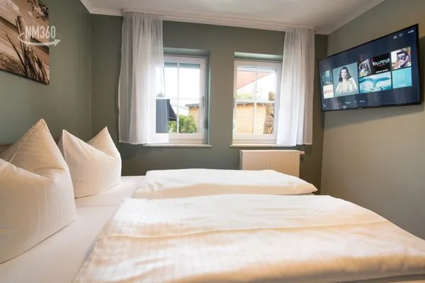 Schlafzimmer  App. 10 mit Terrasse, Privatstrand