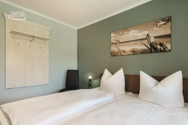 Schlafzimmer  App. 10 mit Terrasse, Privatstrand