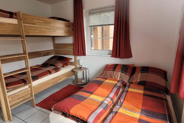 Schlafzimmer Fuhrmannshof Ferienwohnung Cassen