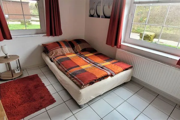 Schlafzimmer Fuhrmannshof Ferienwohnung Cassen
