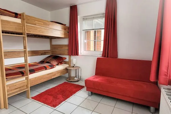 Schlafzimmer Fuhrmannshof Ferienwohnung Cassen