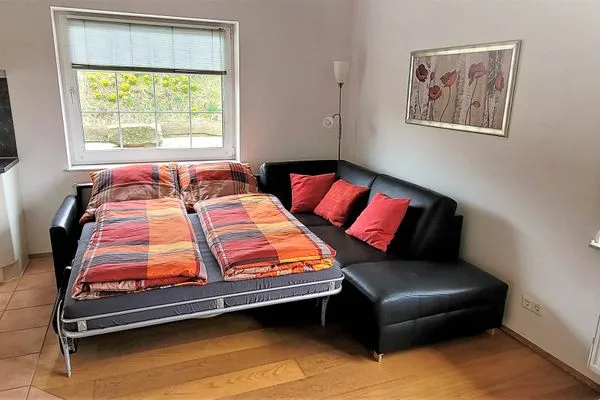 Schlafmöglichkeiten im Wohnzimmer Fuhrmannshof Ferienwohnung Cassen